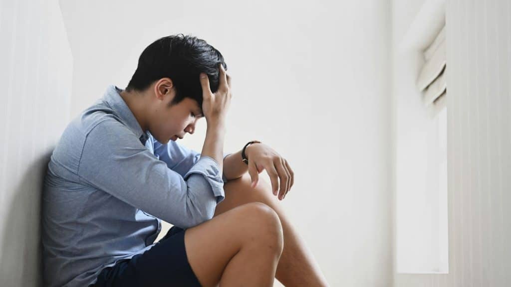 A man sitting alone and sad