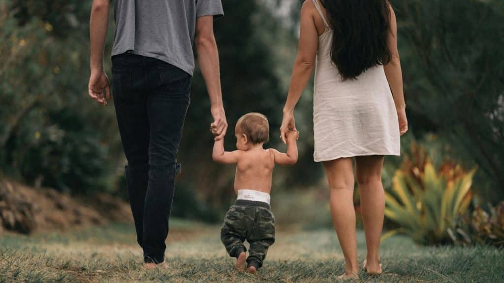 A man and woman with their child 
