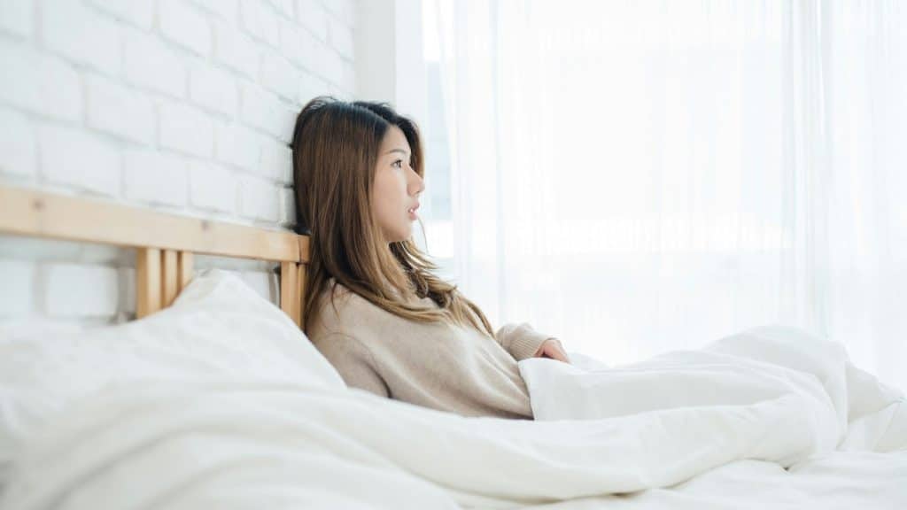 Woman staring at nowhere