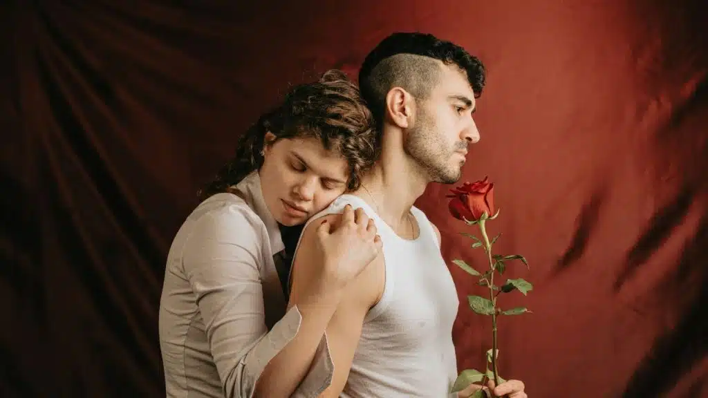 Woman hugging a man