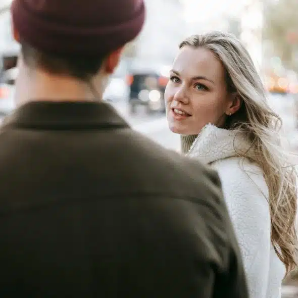 Woman looking at the man
