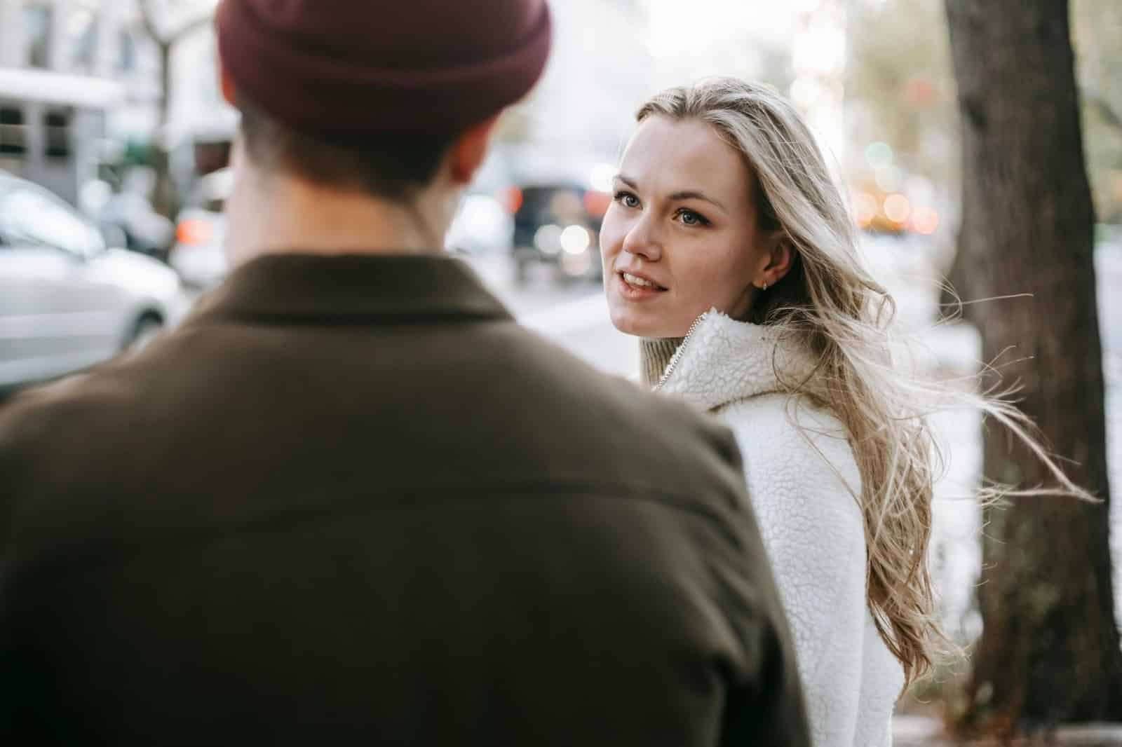 Woman looking at the man