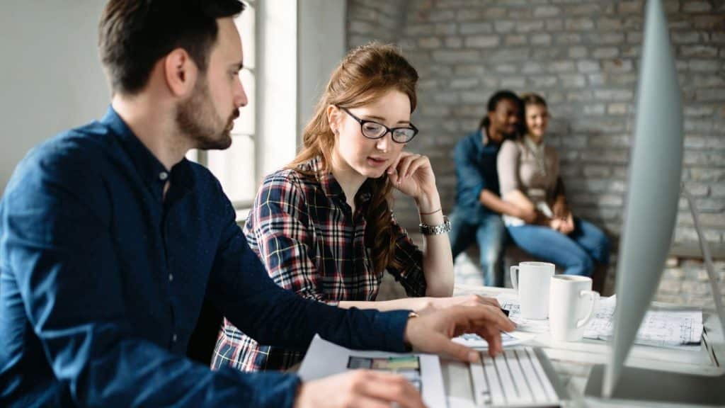 A man and woman working