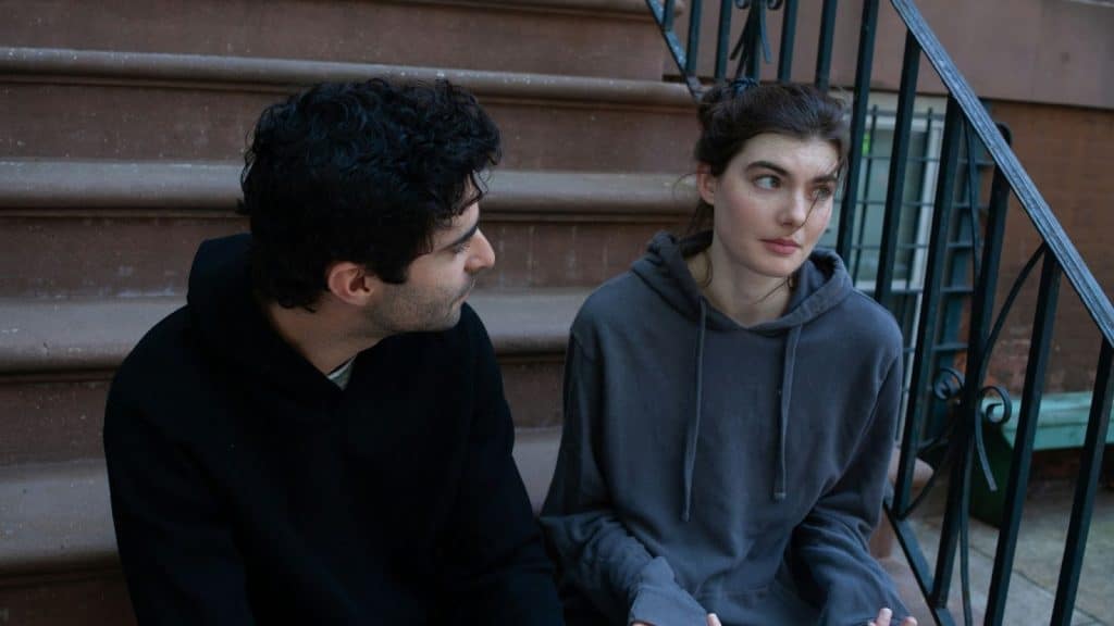 Woman talking to a man
