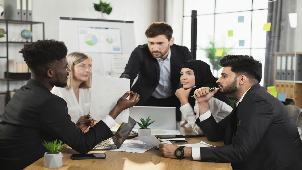 Analysts getting together at a boardroom