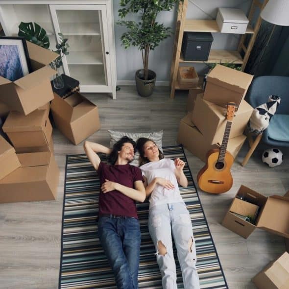 A couple moving into a new home