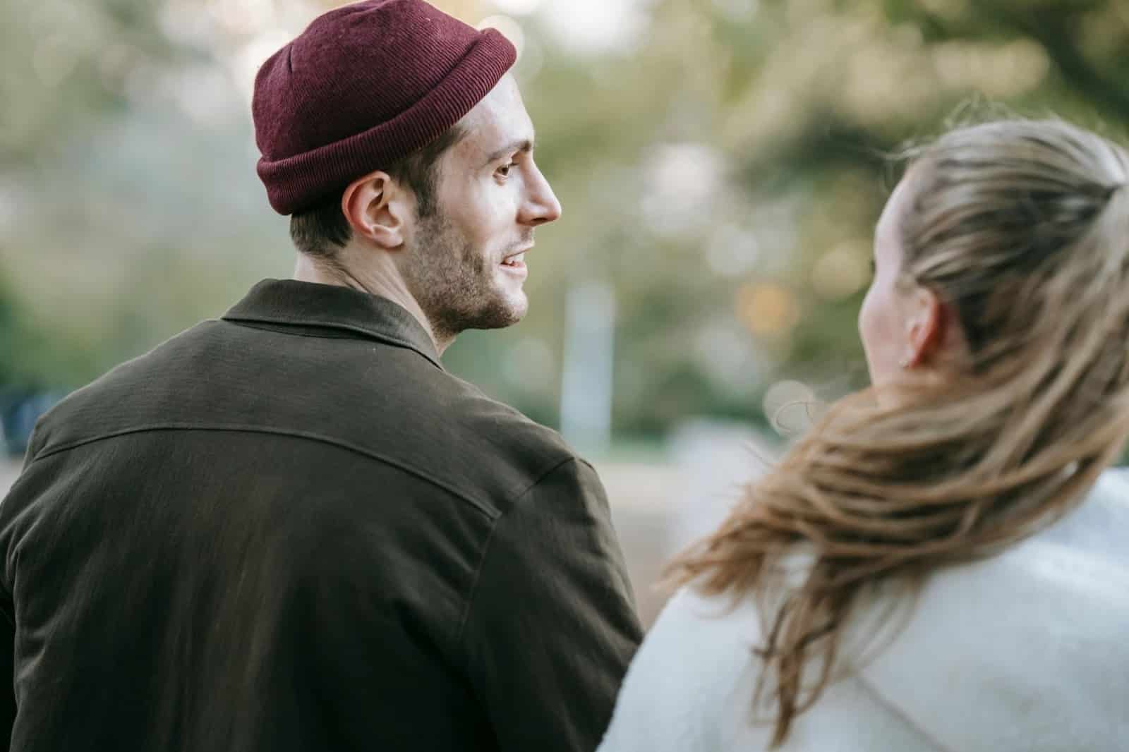A man listening to woman