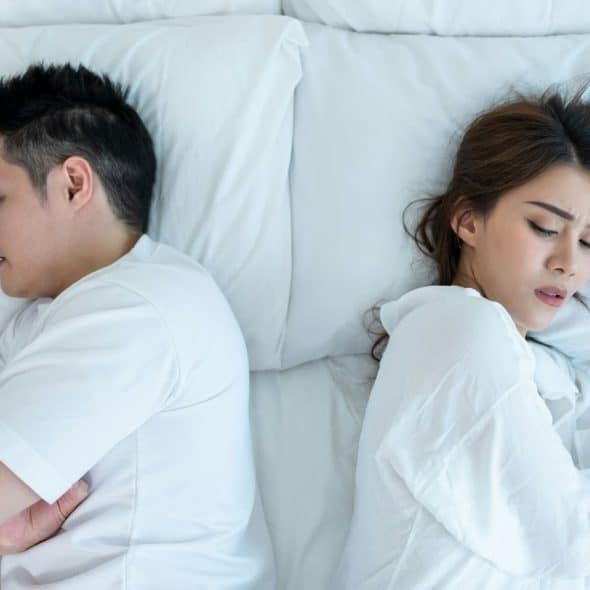 A man and woman not talking to each other