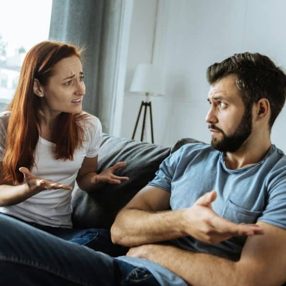 A man getting annoyed to woman