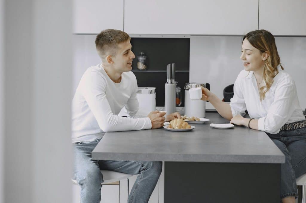 A man and woman talking