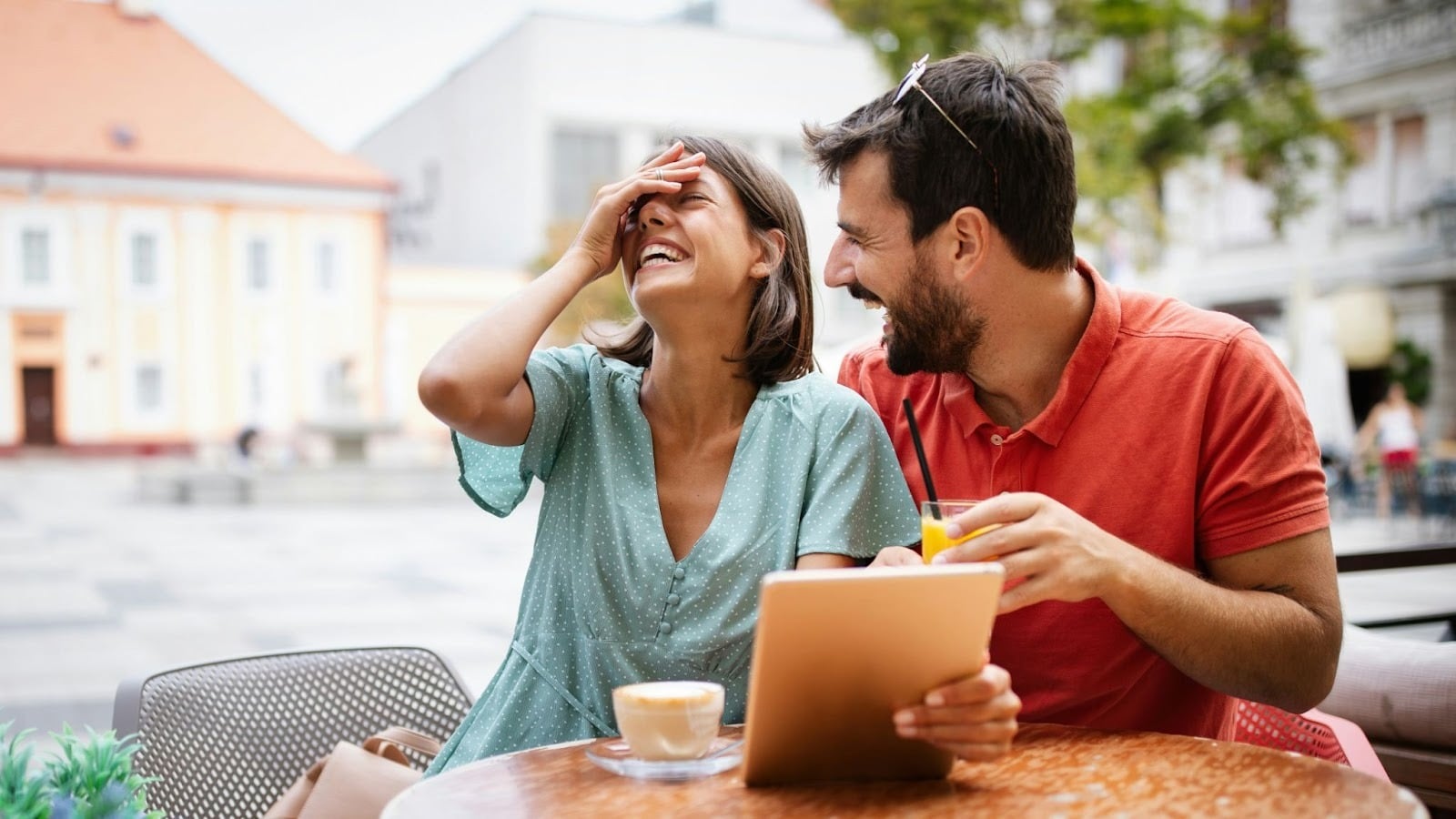 A man and woman laughing
