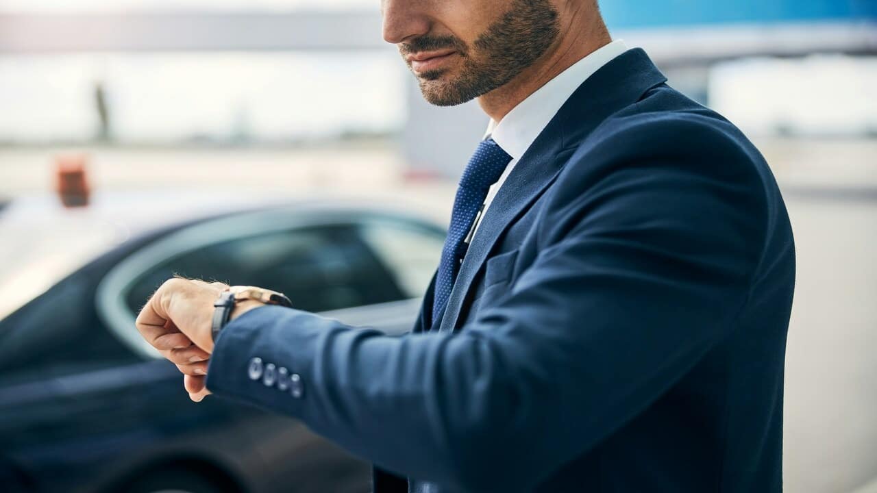 A man checking the time