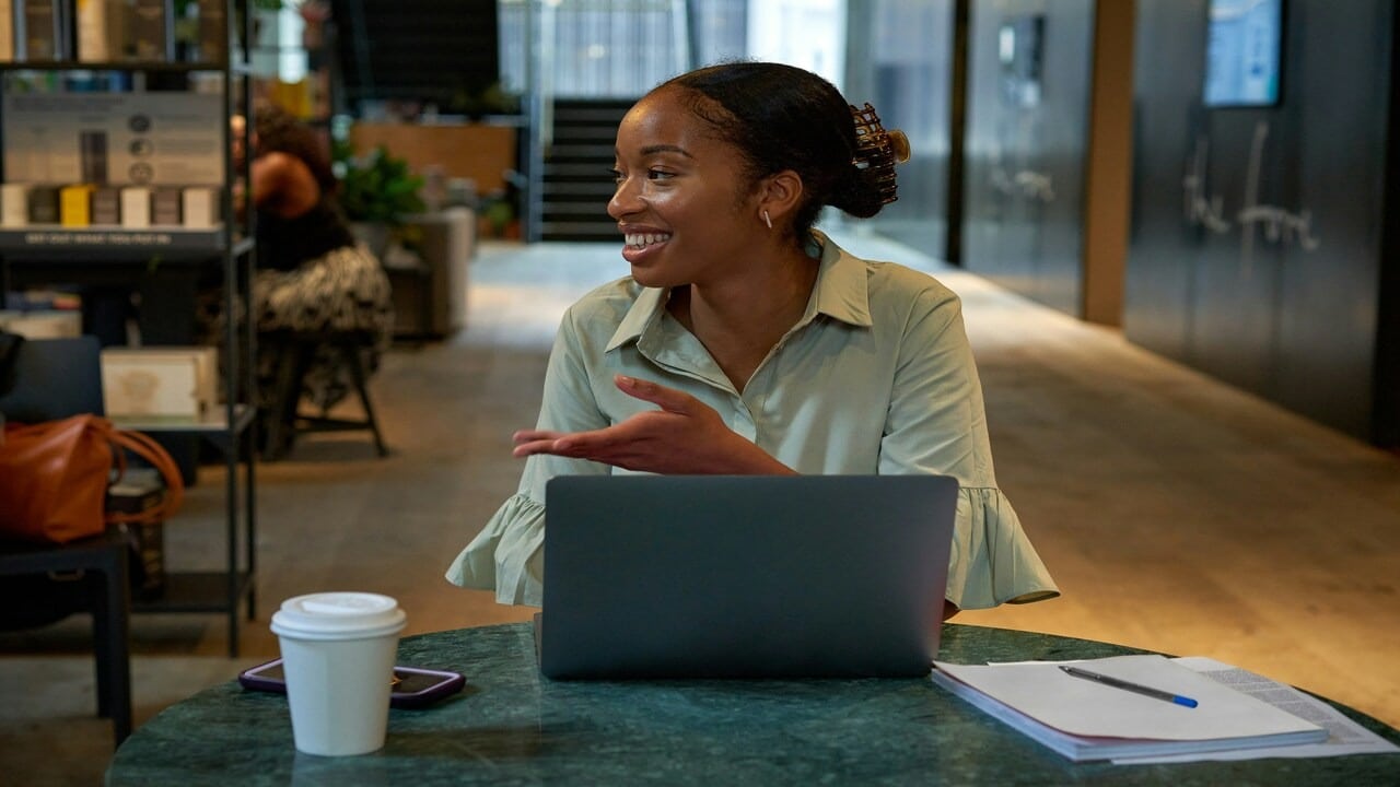 A woman gesturing while talking