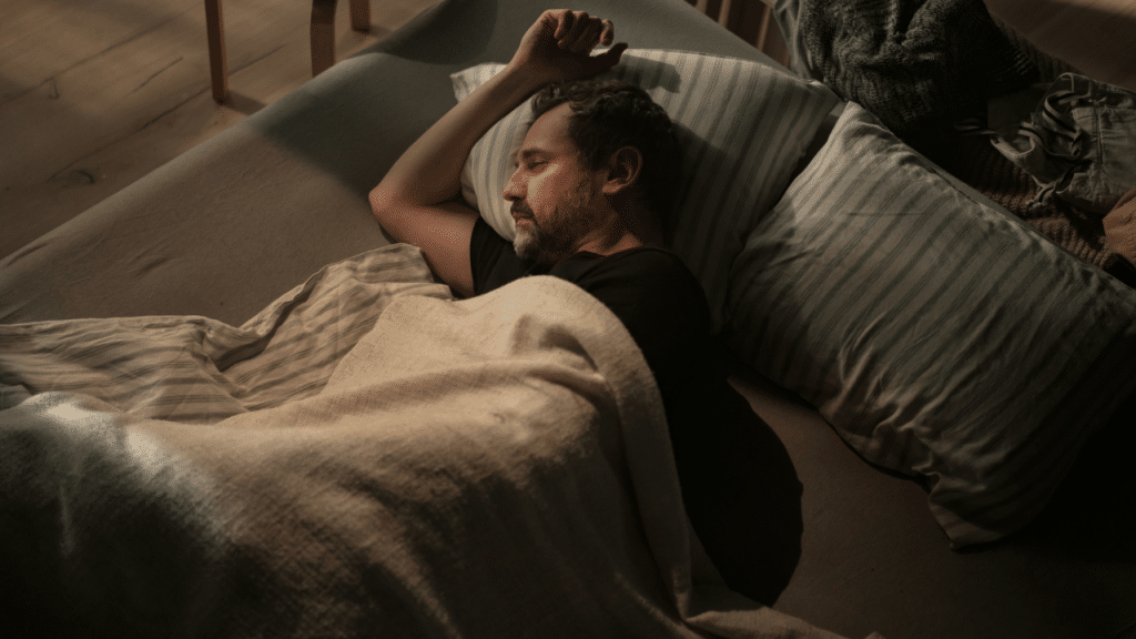 A man laying in bed 