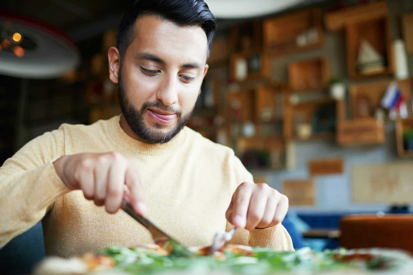 man eating