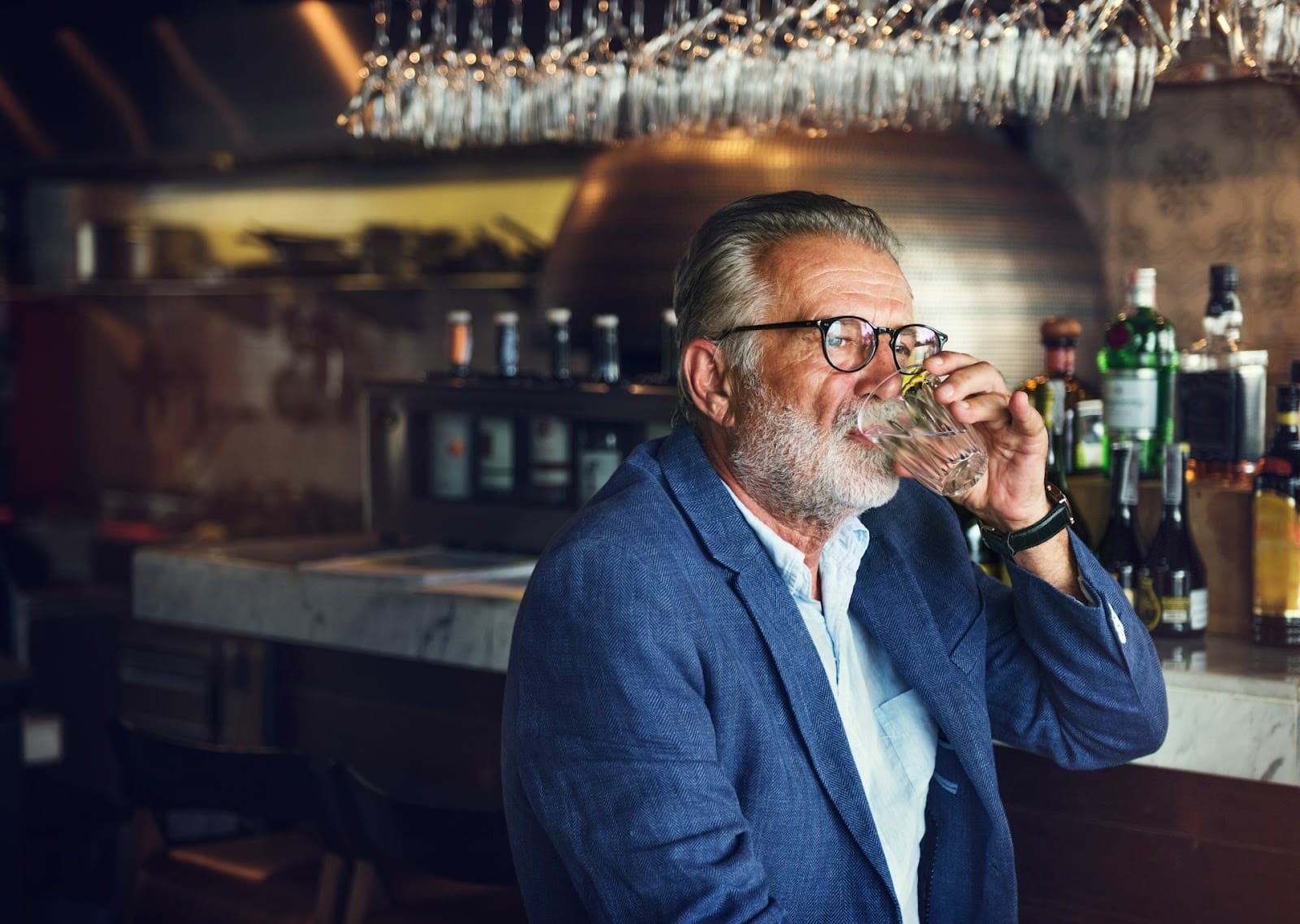 man drinking alcohol