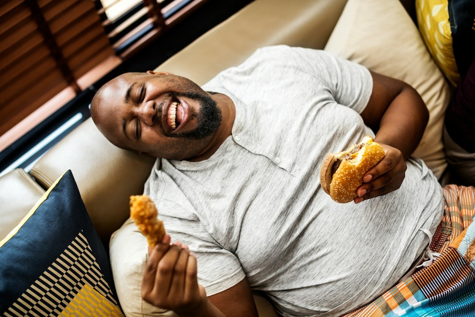 man eating large meal