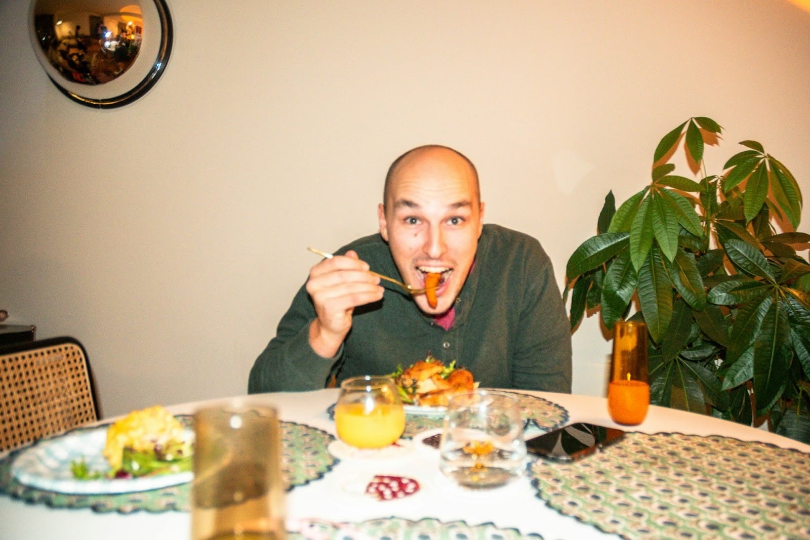 man eating at table