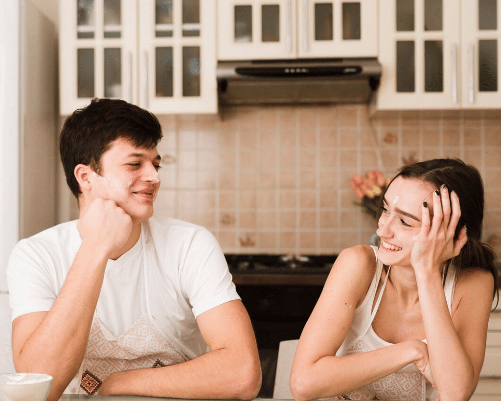 Adorable young couple looking at each other