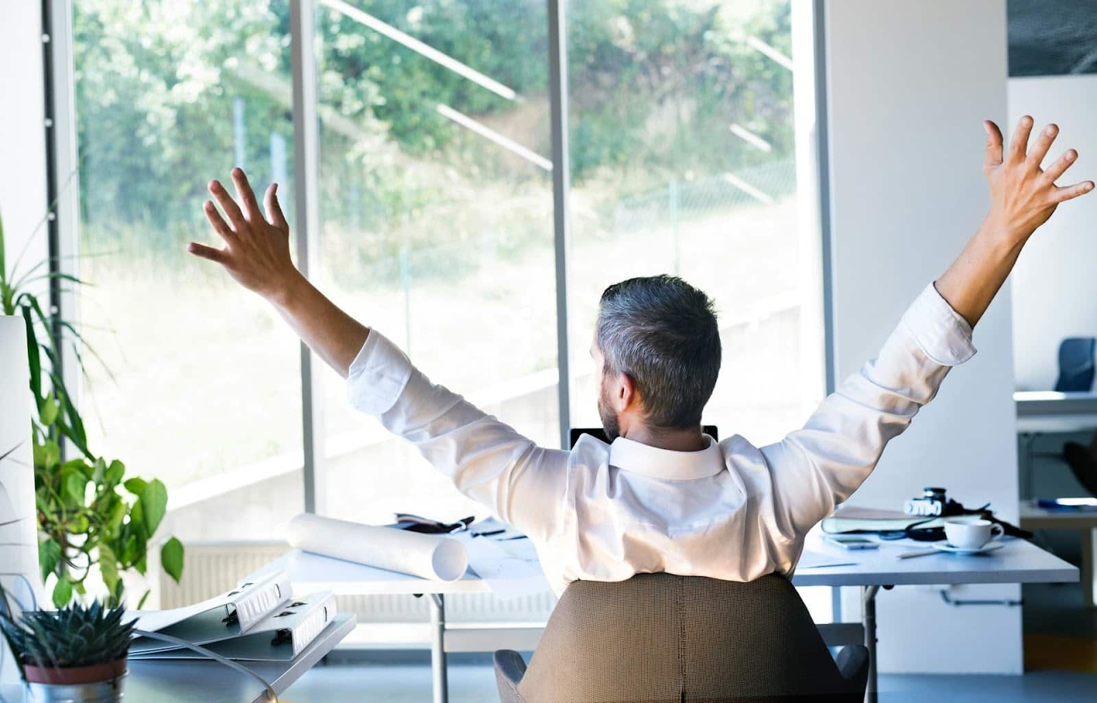 man overwhelmed office