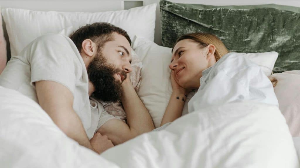 A couple lying in bed