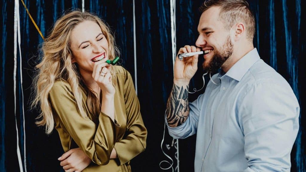 A smiling couple laughing