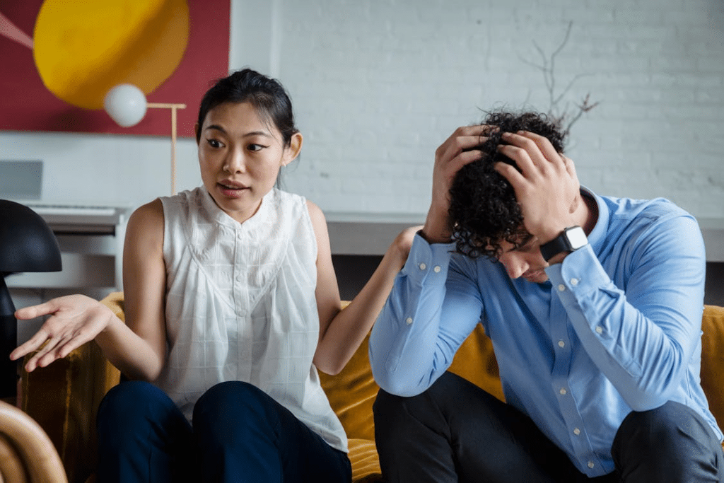 A Couple Sitting while Arguing
