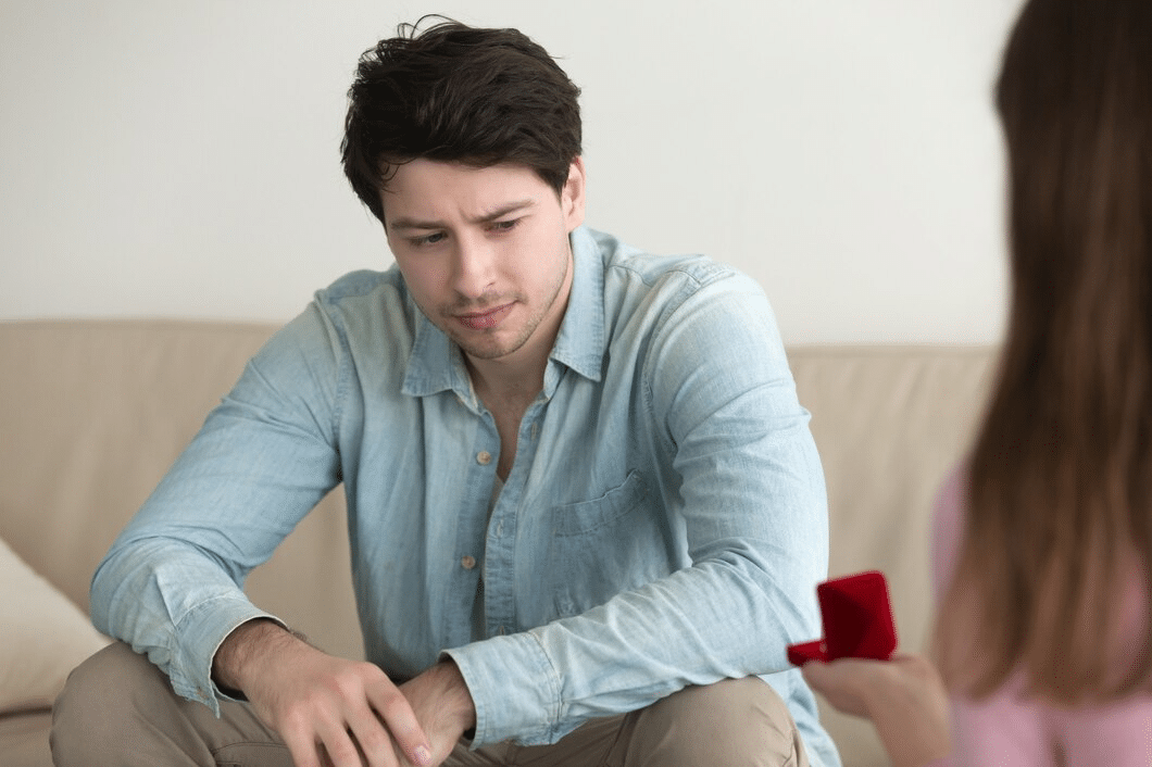 Man looking upset at woman