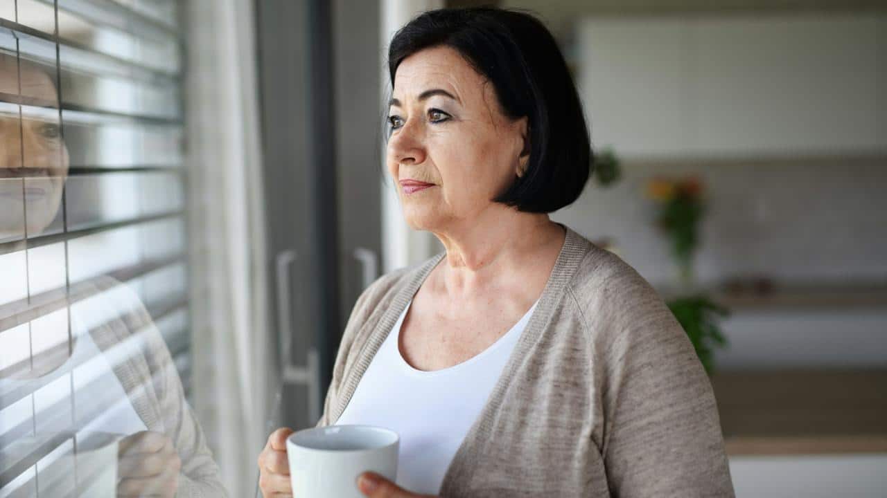 A woman holding a mug