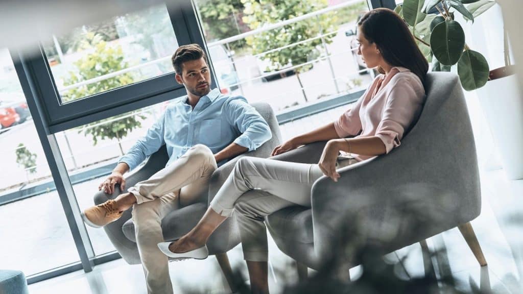 A man and woman talking