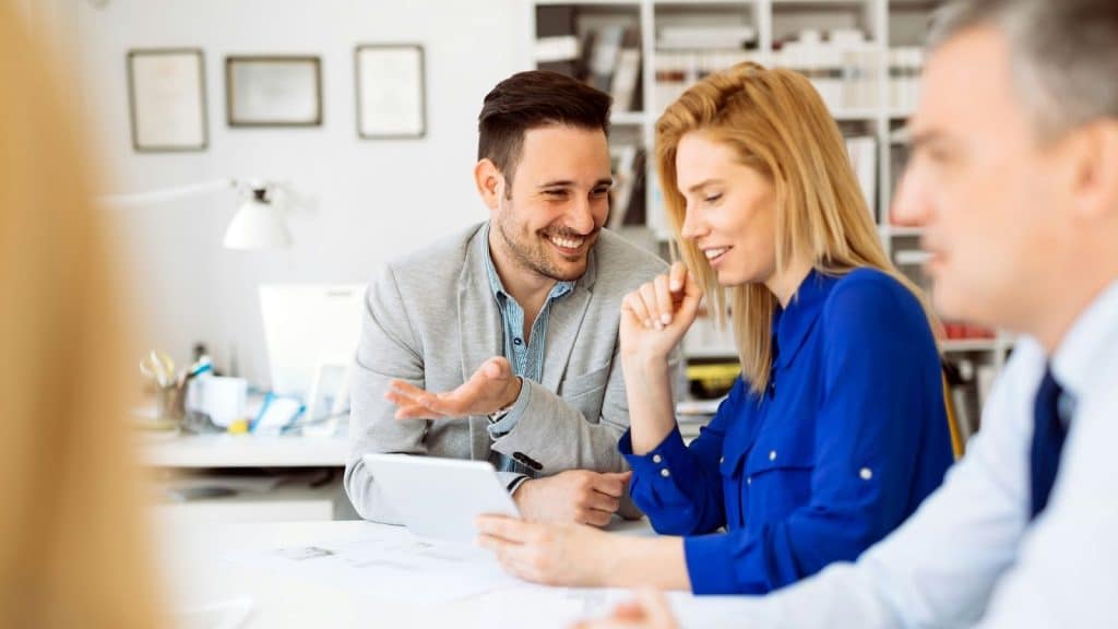 Woman acting awkward and a man trying to talk to him