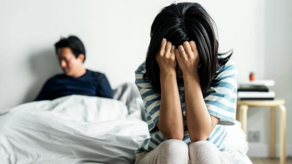 A man and woman not talking to each other