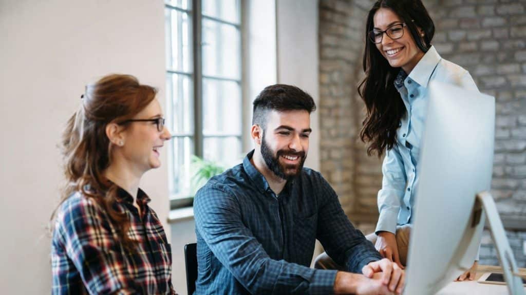 Man with his co-workers