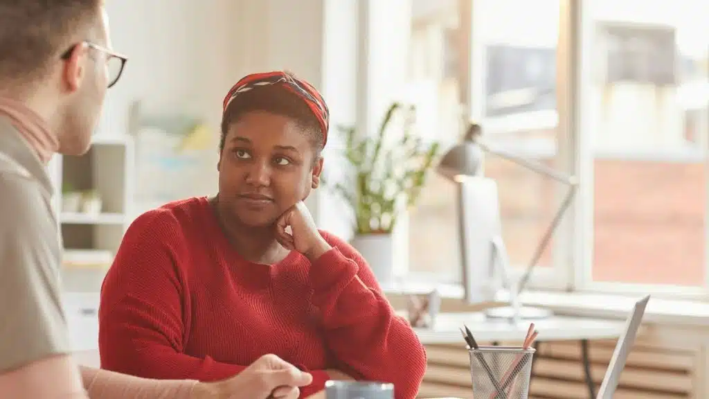 Woman listening to a man