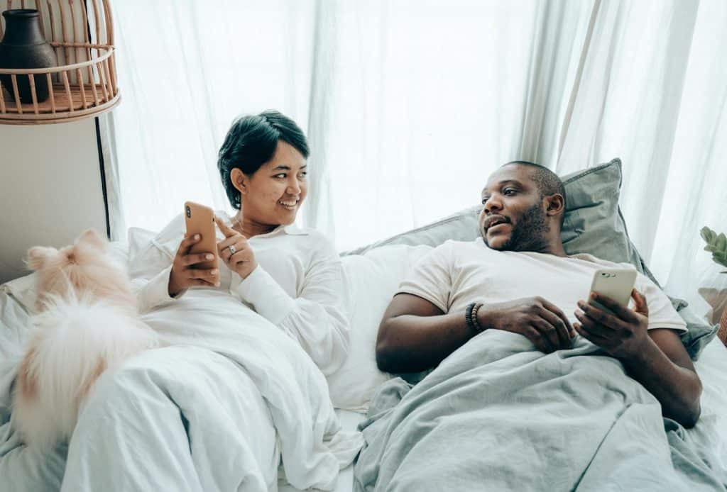 A man and woman at the bed 