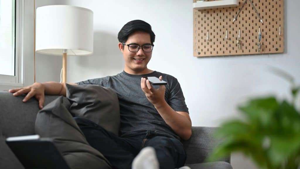 A man sitting at the sofa