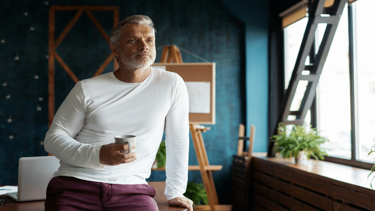 A man having coffee at work