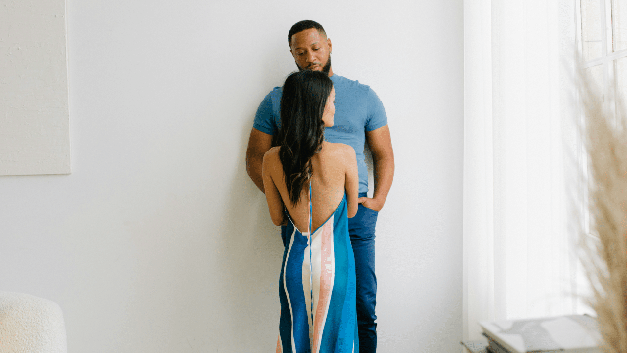A couple looking sad at home