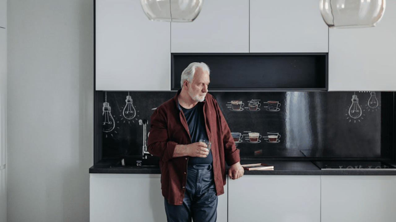 A man looking sad at home