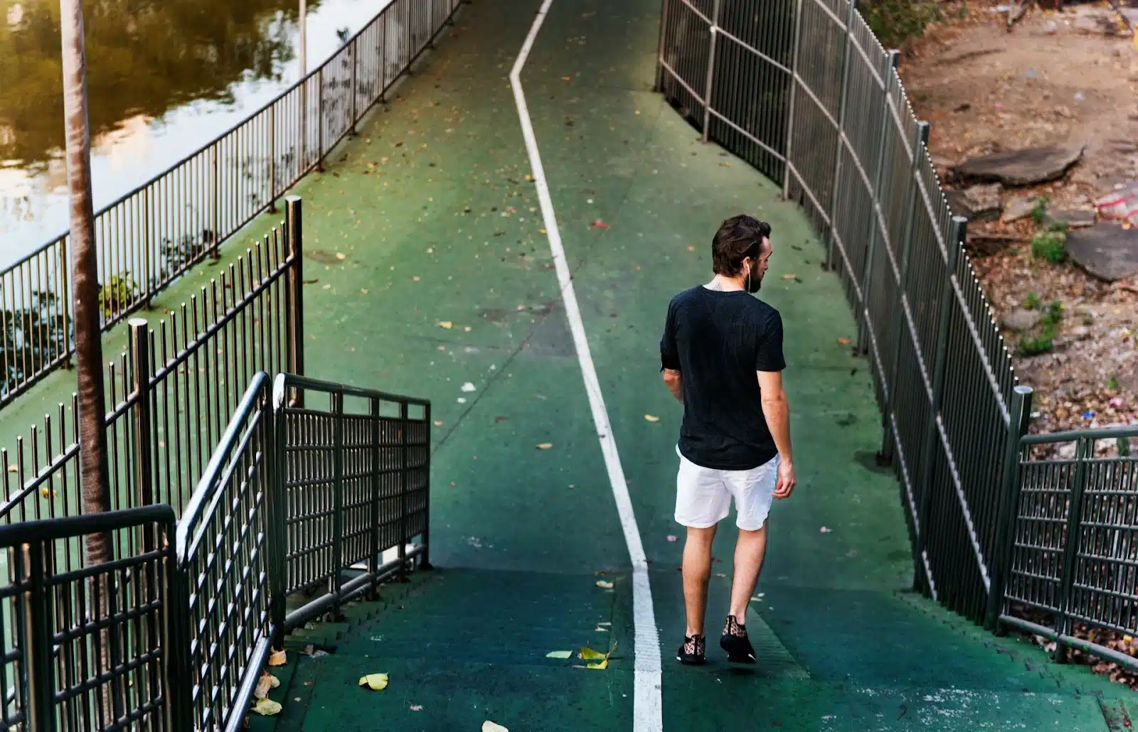 man walking alone park
