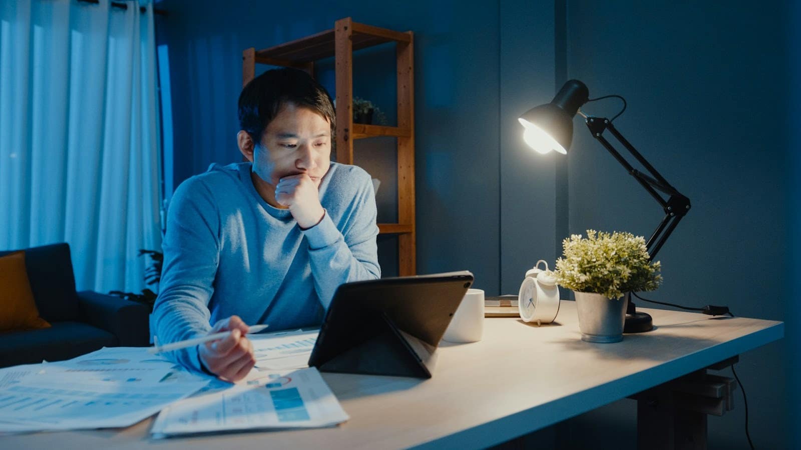 man working late office