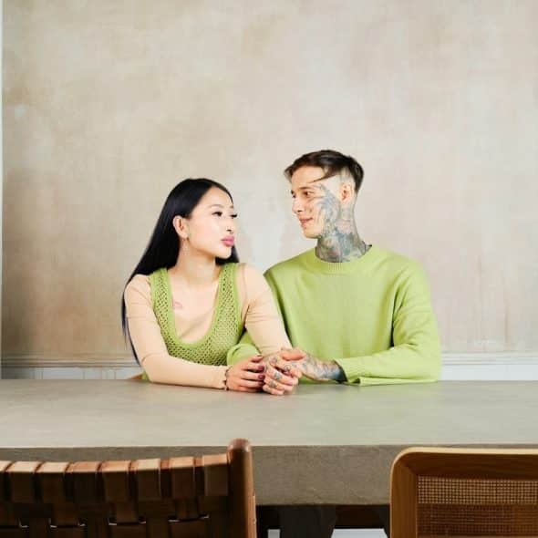 couple having serious conversation indoors