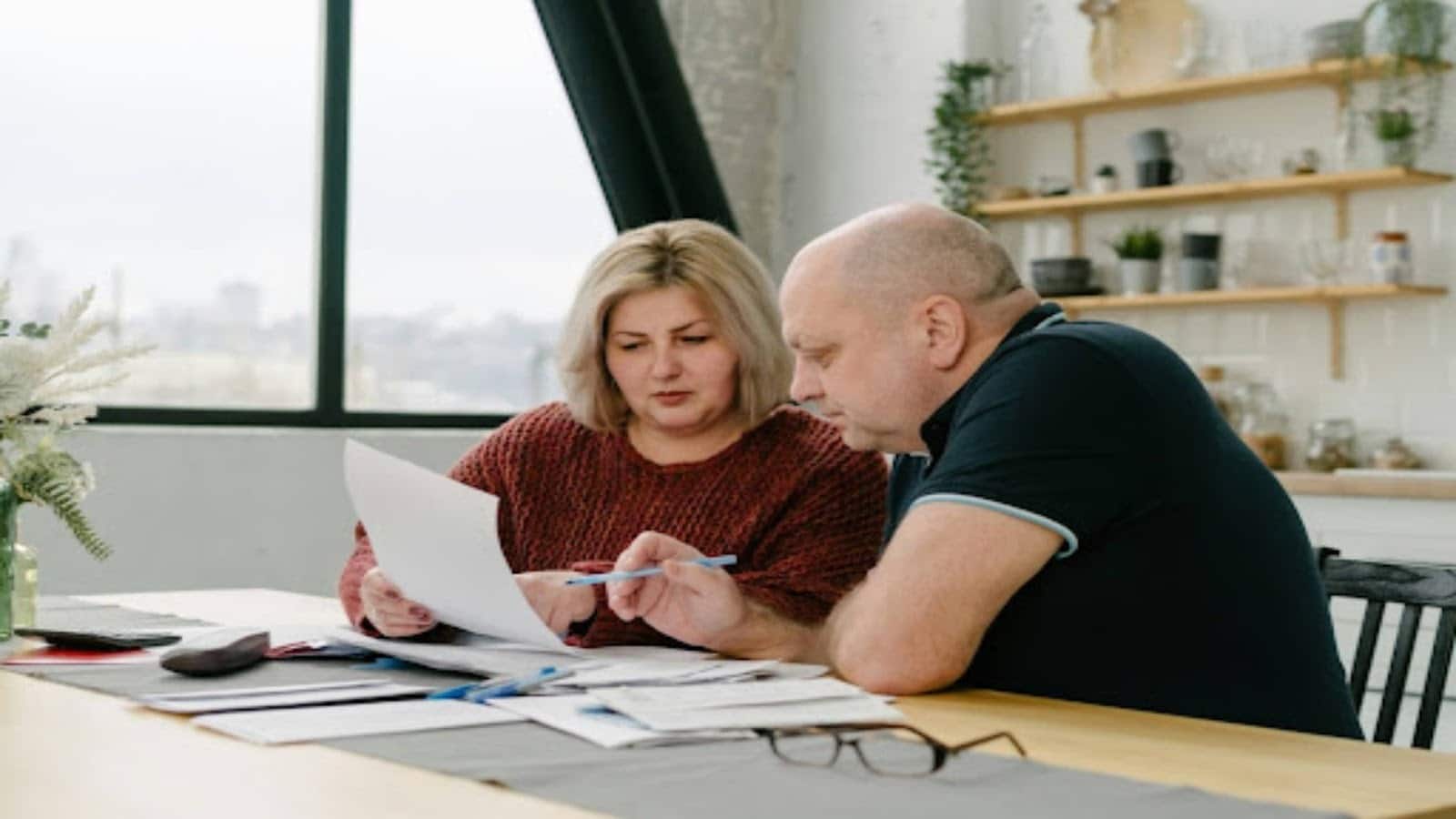 couple reviewing household bills