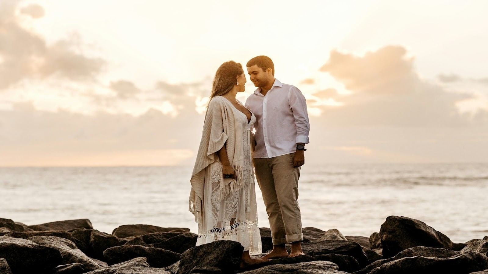 couple standing side by side confidently