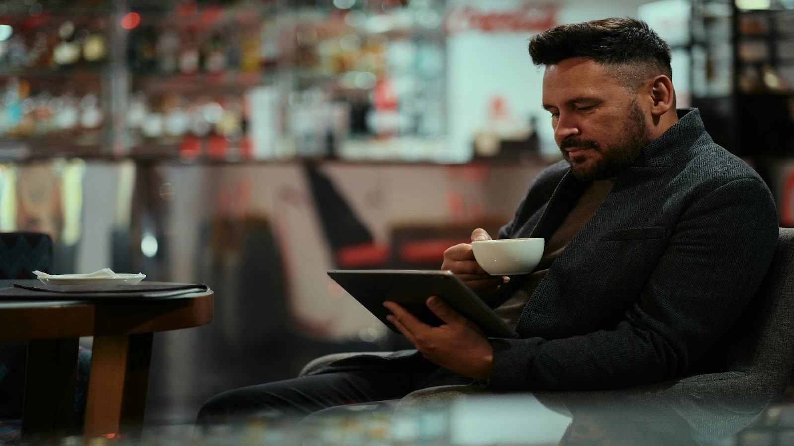 man sitting alone at café