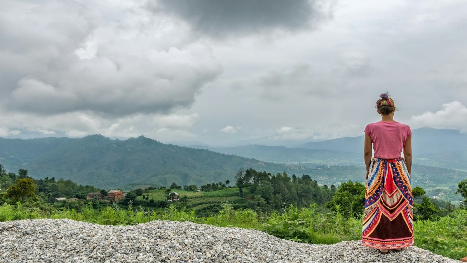 adult standing alone outdoors