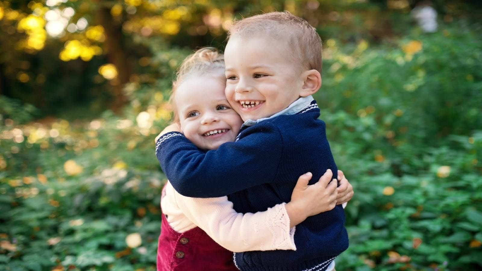 older sibling caring for younger child