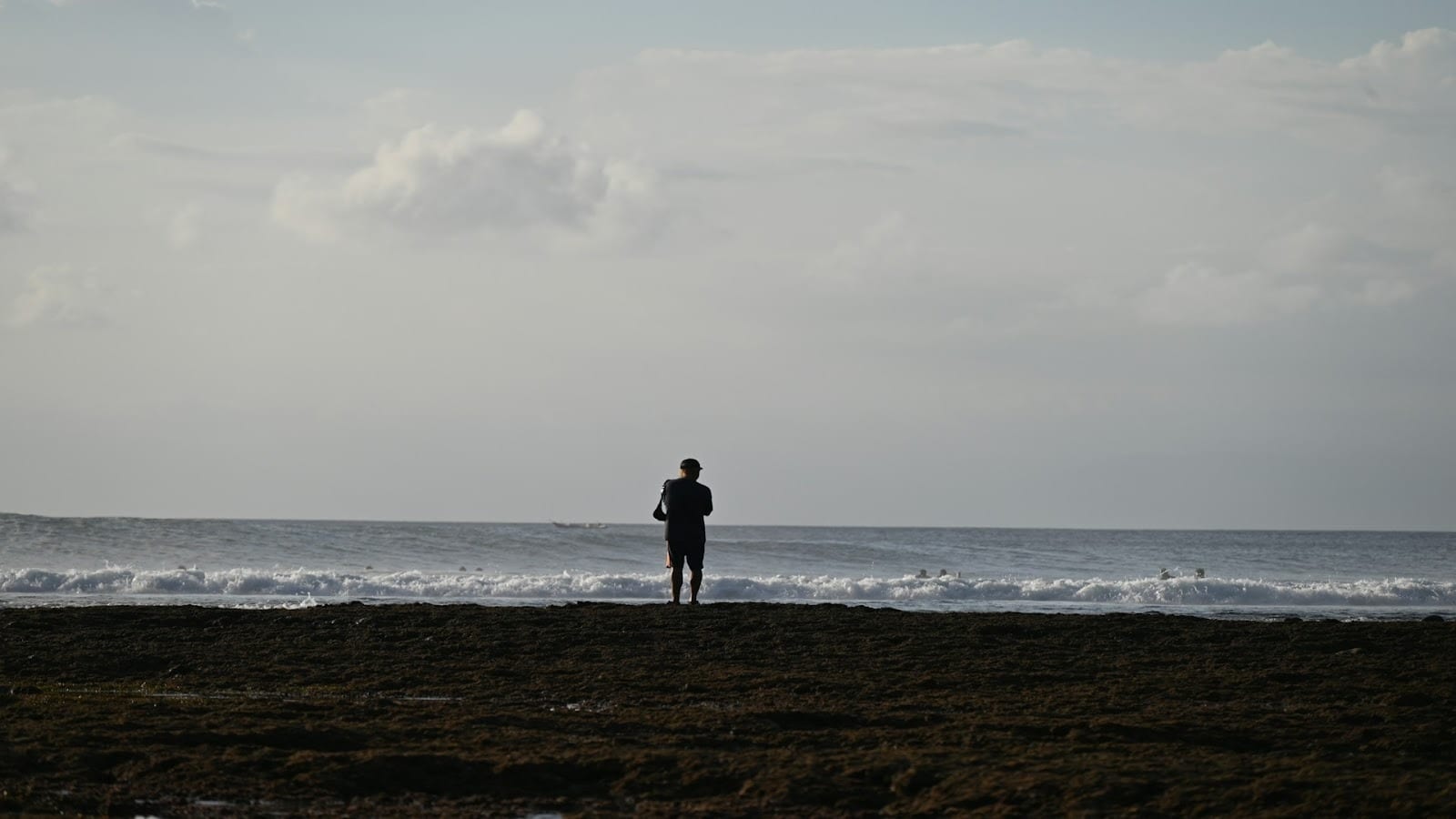 adult standing confidently alone