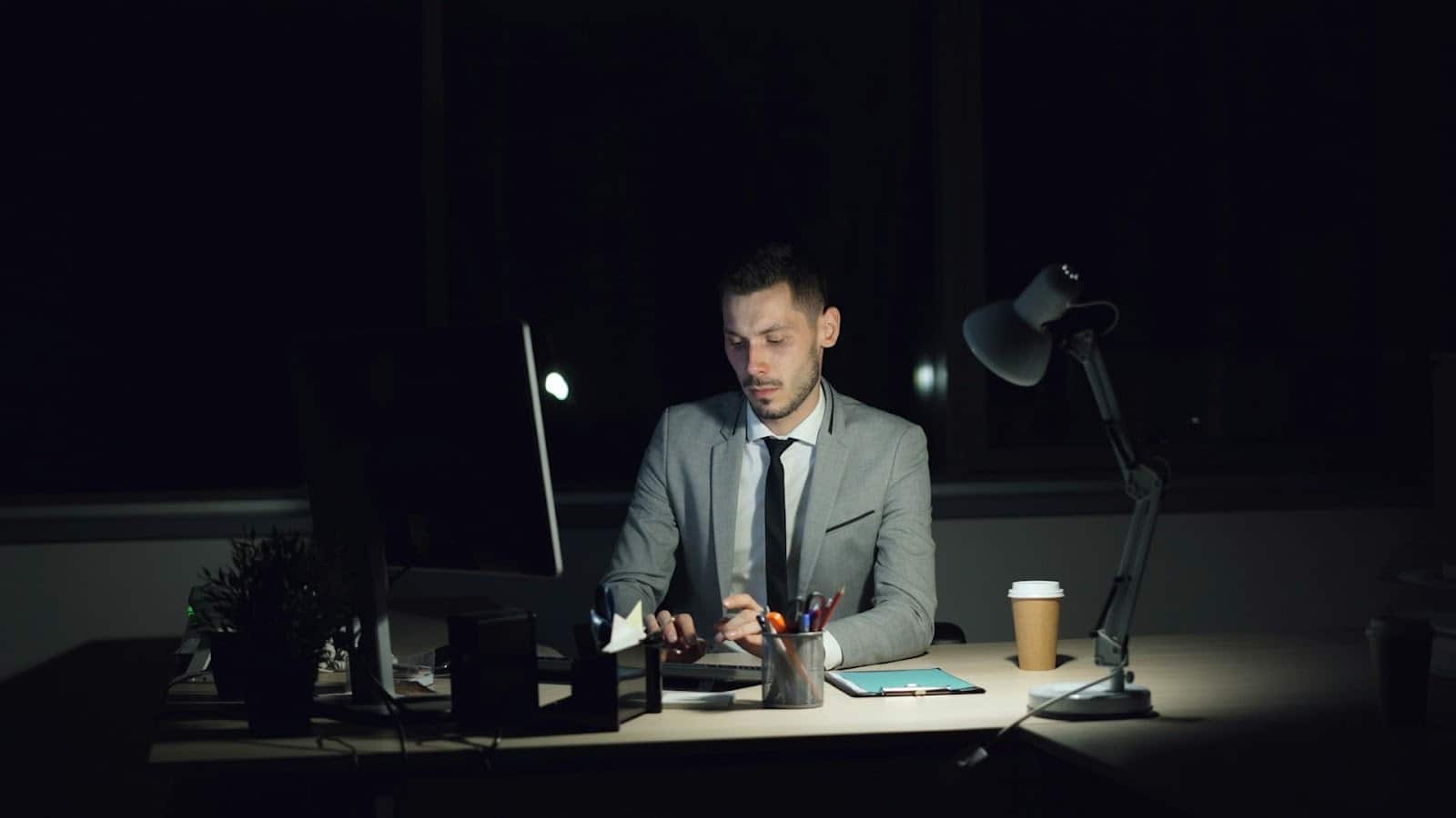adult working late at desk