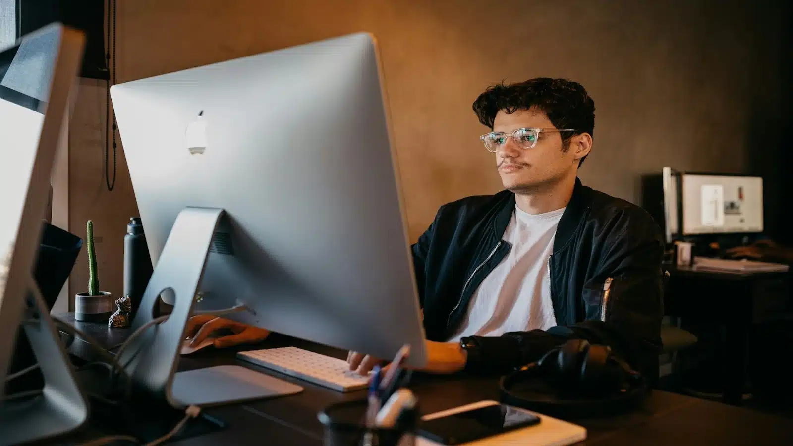 man looking at laptop seriously